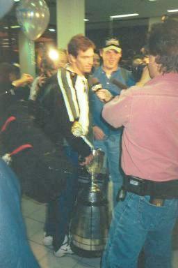 Masotti with Cup in Media scrum